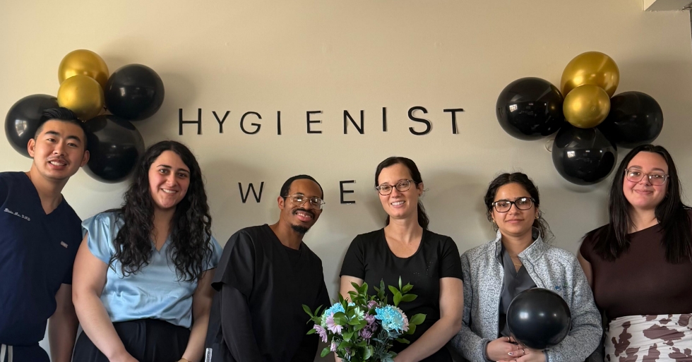 The smiling Meriden dentist and team at Care Dental Associates