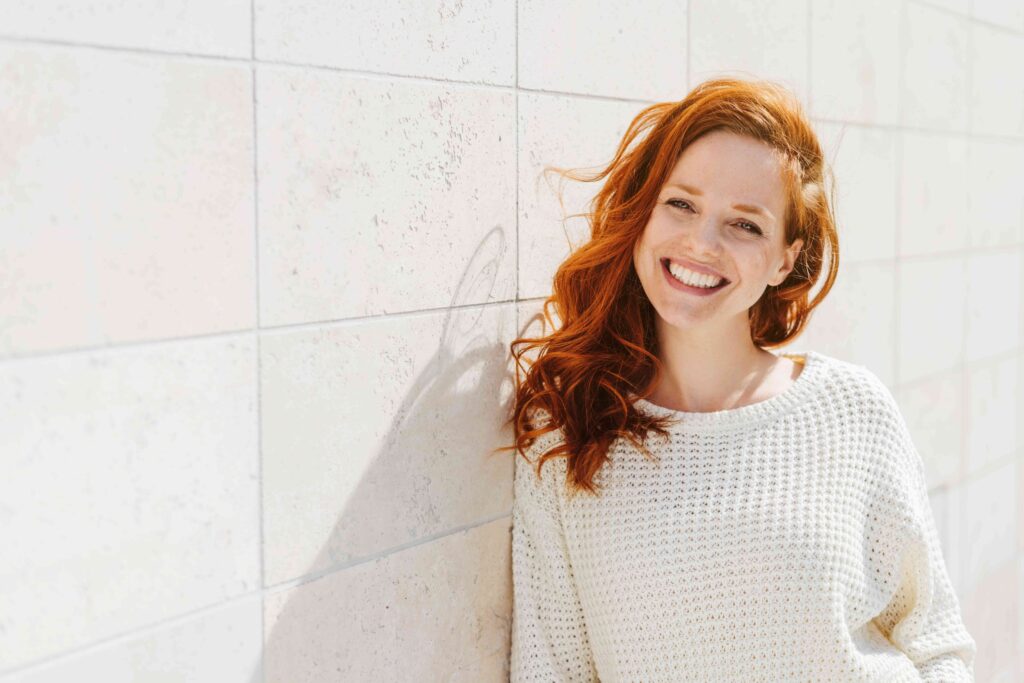 Woman smiling outside