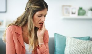 Woman with tooth pain